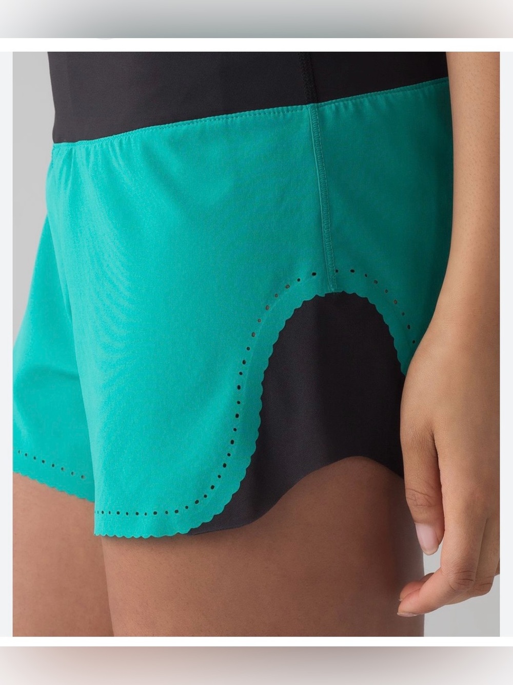 Lululemon Smooth Stride shorts. Teal and black. Size 4. EUC.